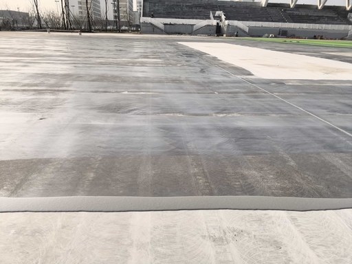 Prepared track base before the installation of the sports surface